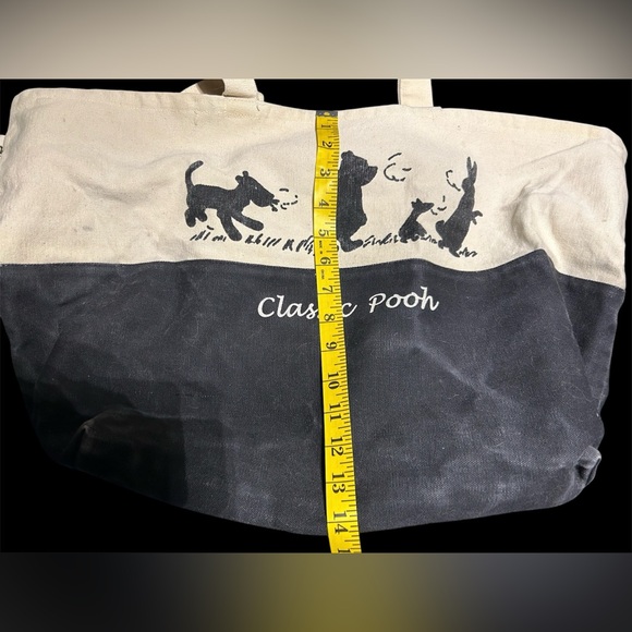 Disney Winnie the Pooh tote bag. Well loved. Some wear discoloration. Zip close. - Picture 4 of 13